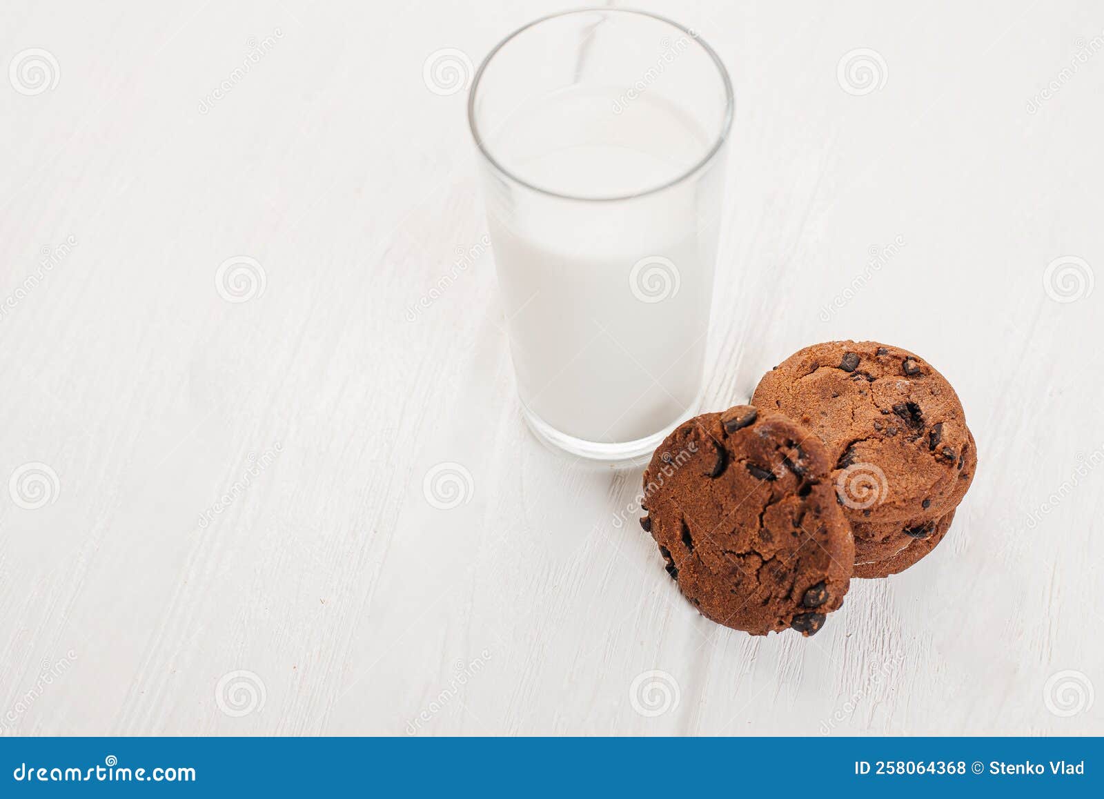 A Glass of Milk and Chocolate Biscuits for Breakfast Stock Photo