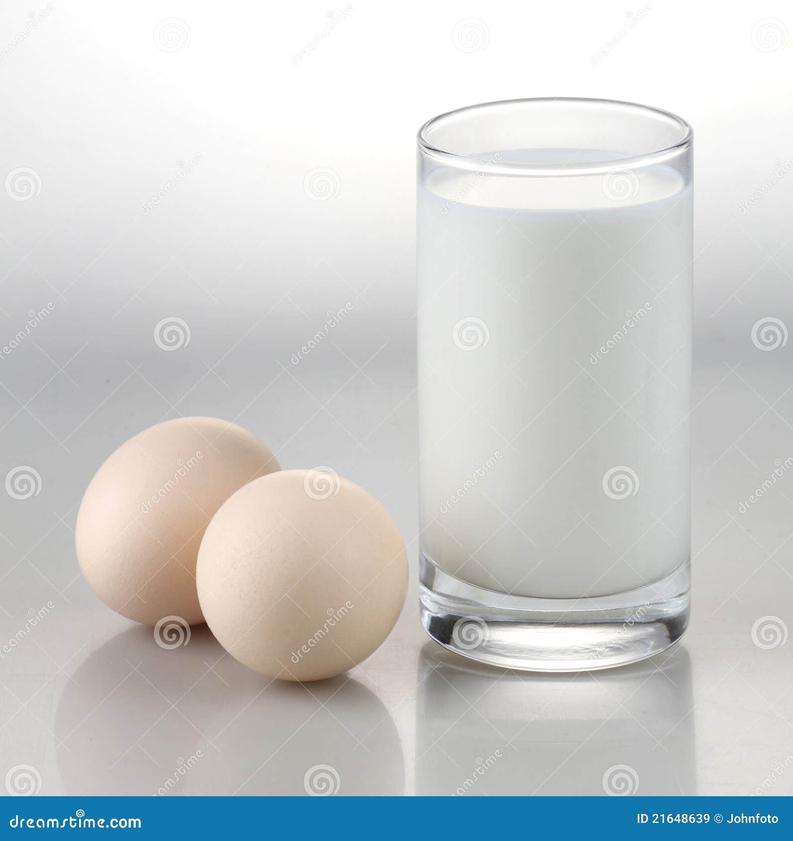 Glass with milk and eggs stock image. Image of dairy 21648639