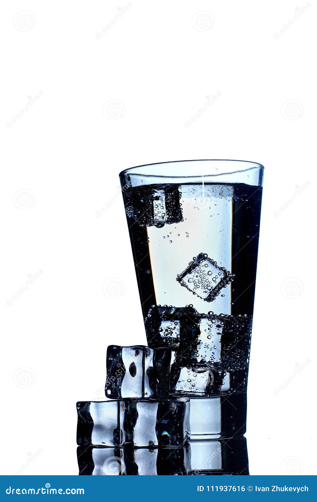 Glass of Mineral Carbonated Water with Ice Stock Photo Image of cube, closeup 111937616