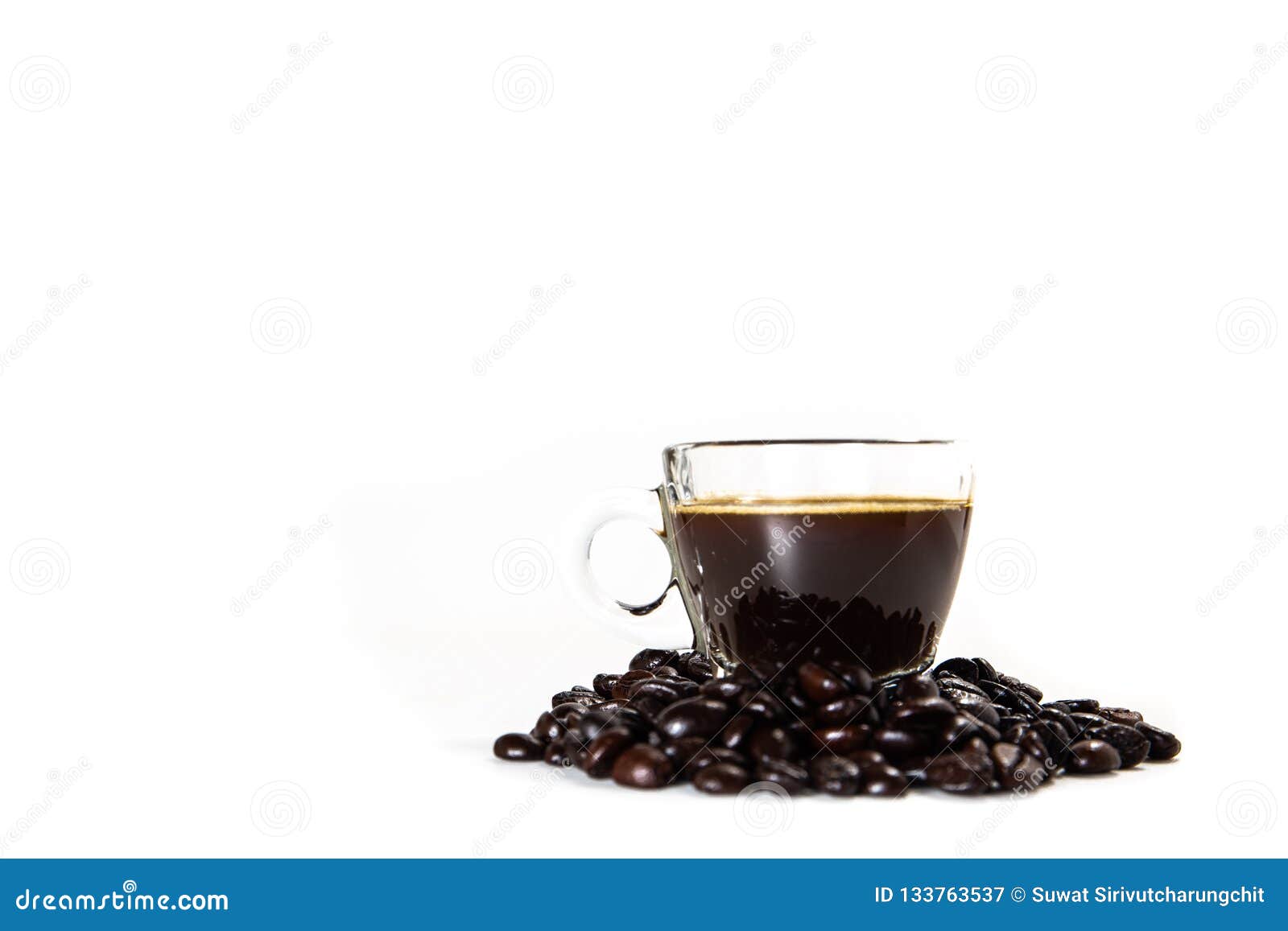 the glass mug of coffee and coffee bean