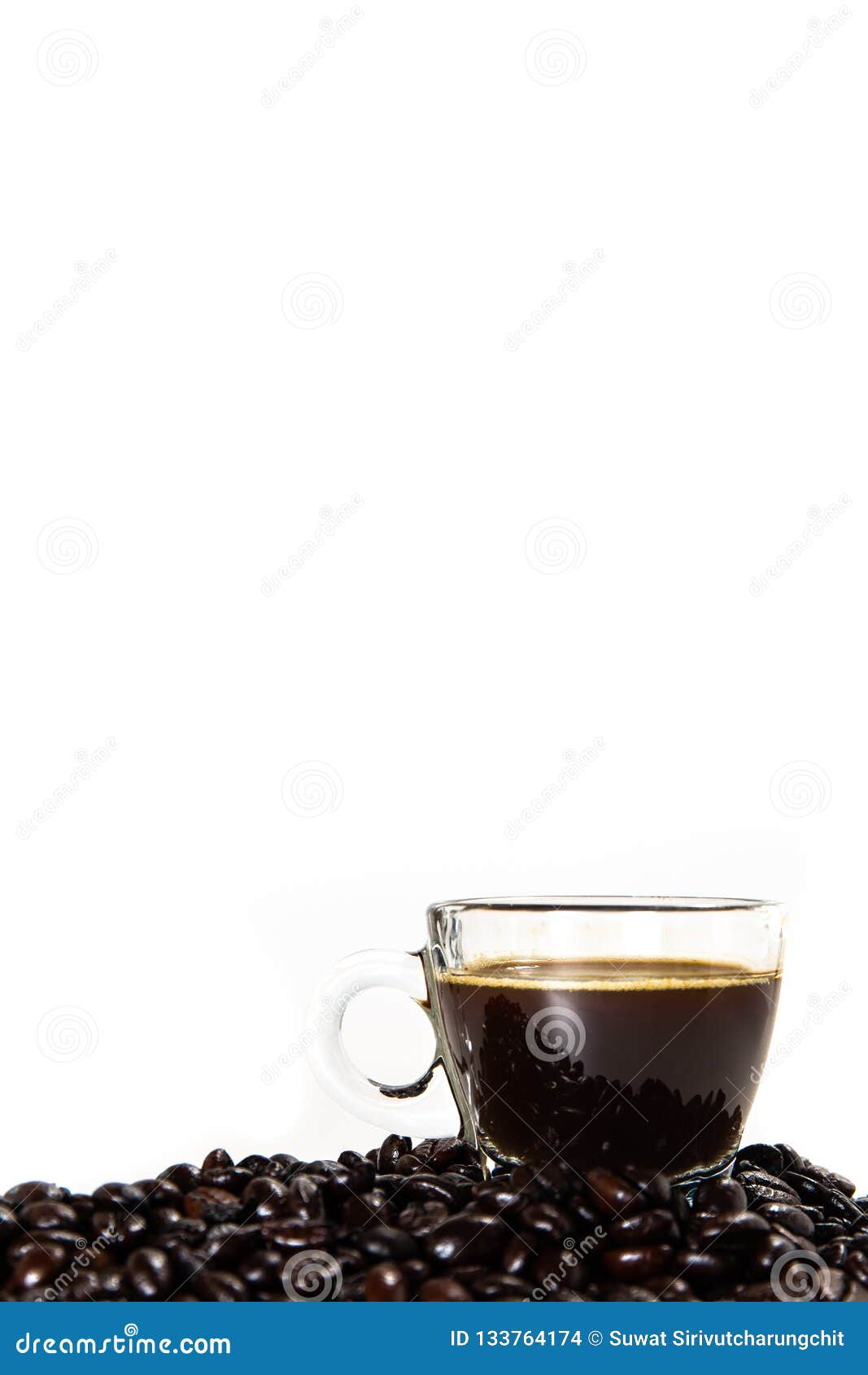 the glass mug of coffee and coffee bean