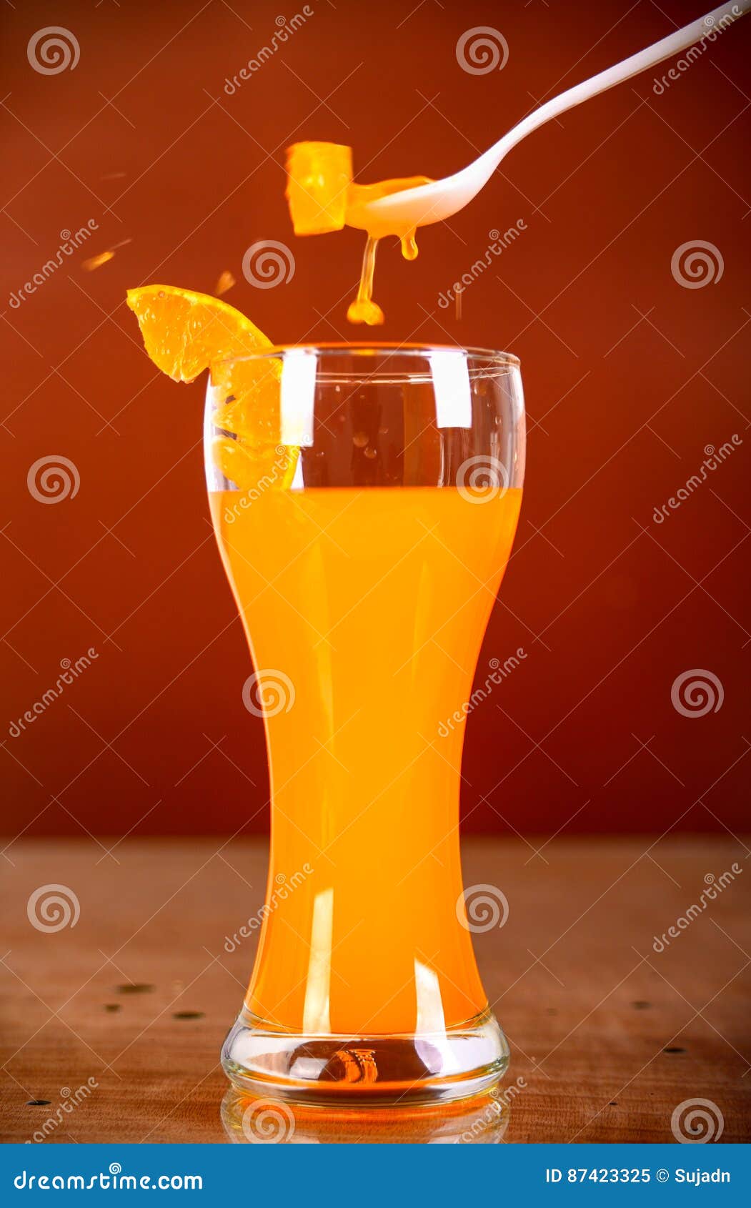 Glass of Orange Juice on Brown Background Stock Image Image of
