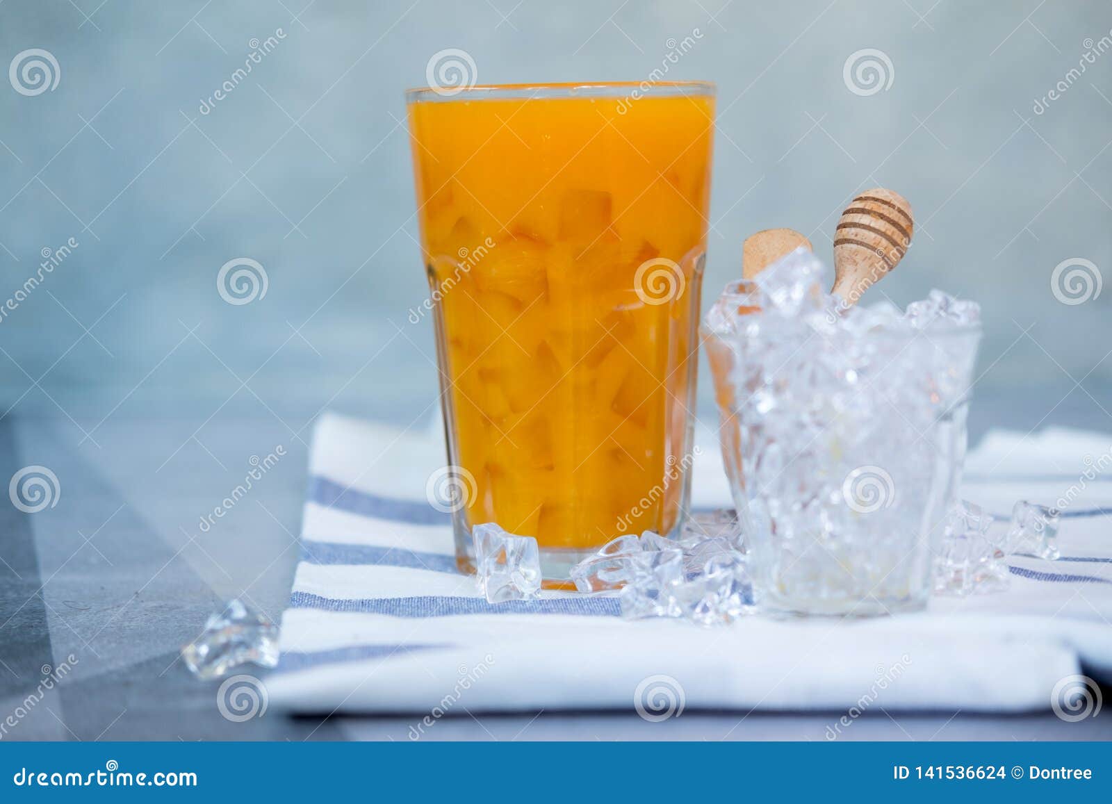 Glass of Orange Juice with Ice Cubes Stock Photo Image of piece, cold 141536624