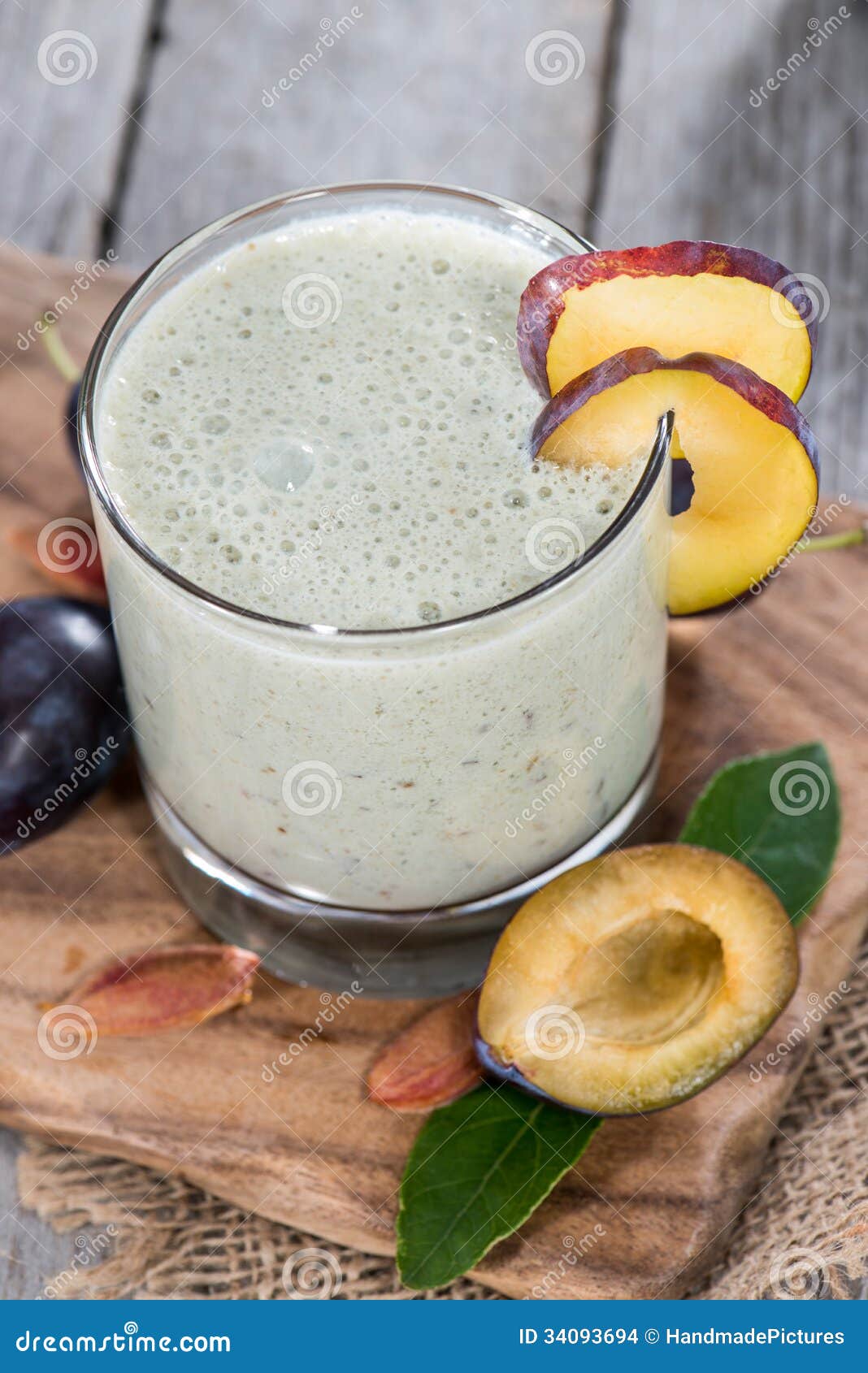 Glass with Plum Milkshake stock photo. Image of dessert 34093694