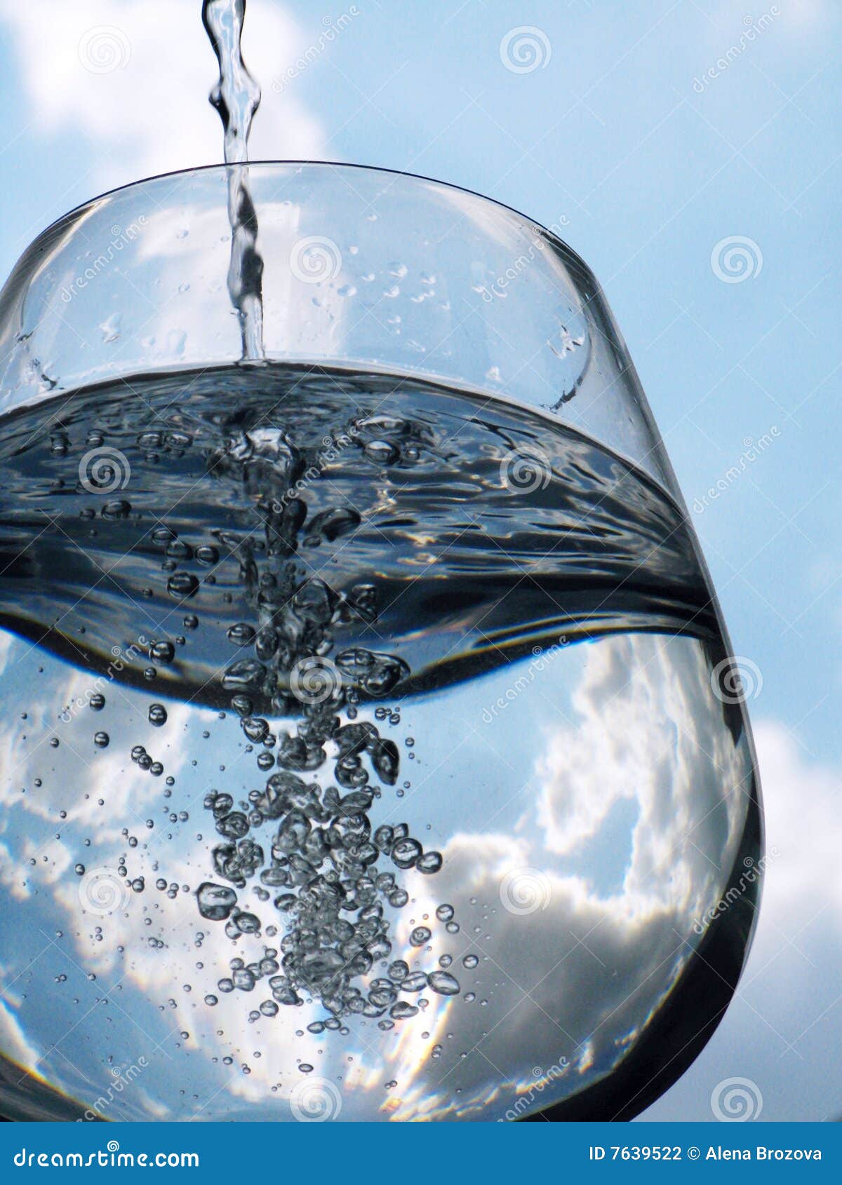 Glass of Pouring Water with Reflection Stock Photo Image of clouds, bowl 7639522