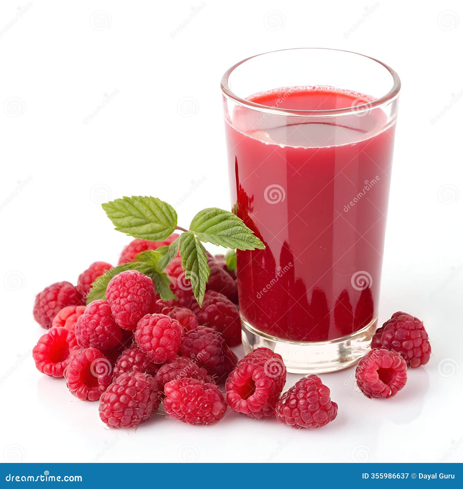 glass of raspberry juice with berries  on white background