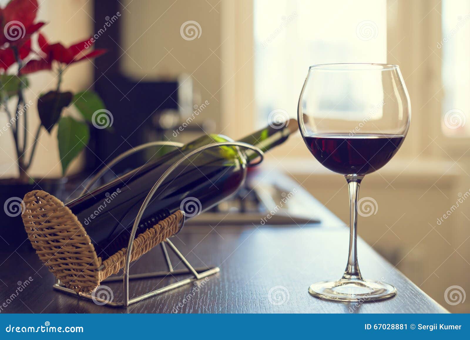 Glass of Red Wine with Bottle on the Kitchen Table Stock Image Image