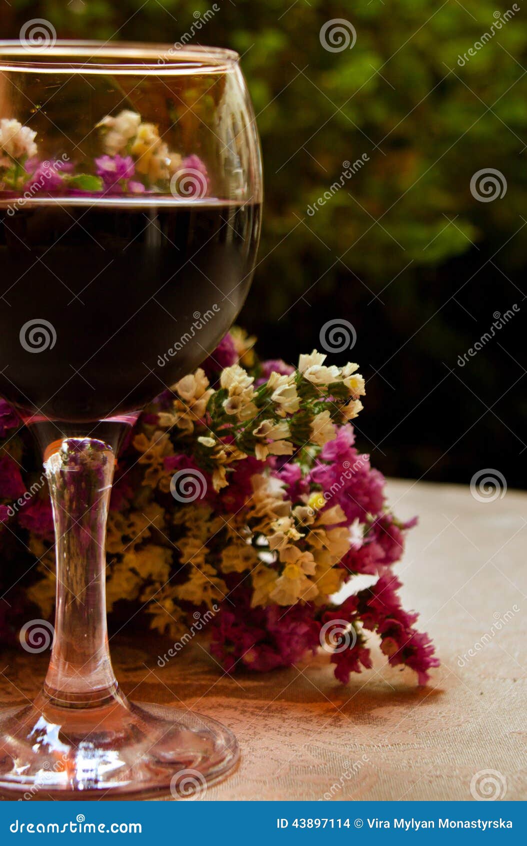Glass of Red Wine and Flowers Stock Photo Image of alfresco, beverage