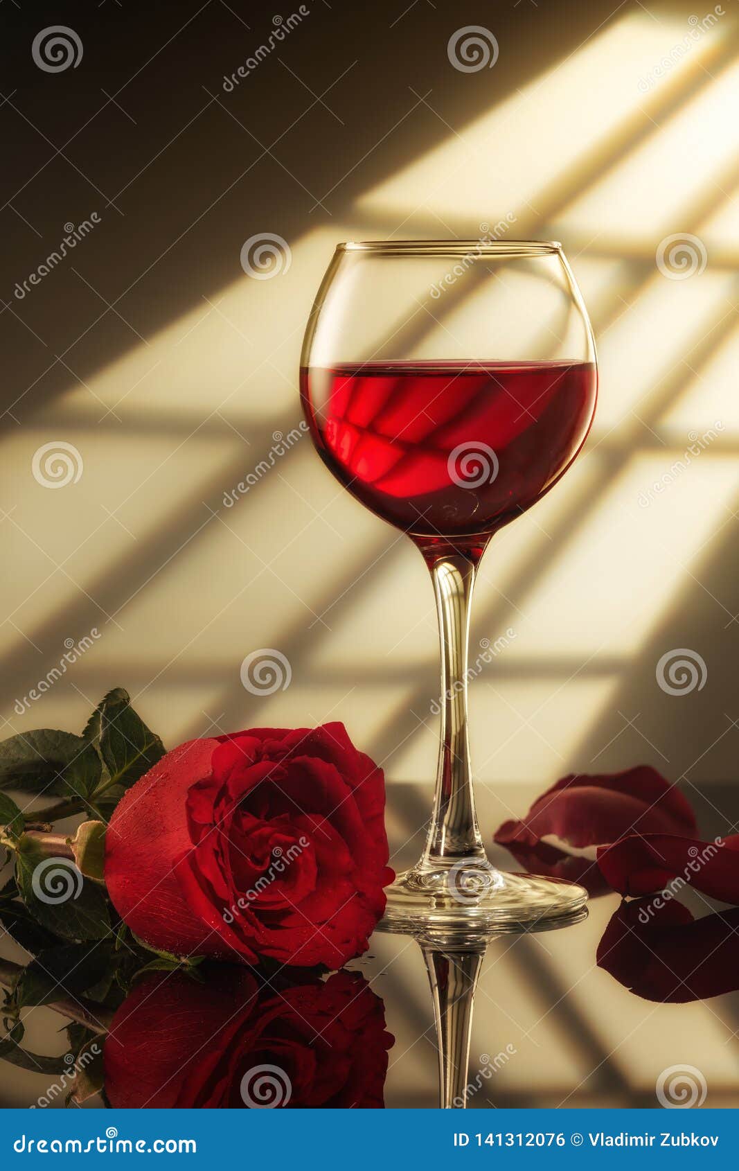 A Glass of Red Wine and a Red Rose Stock Photo Image of liquid