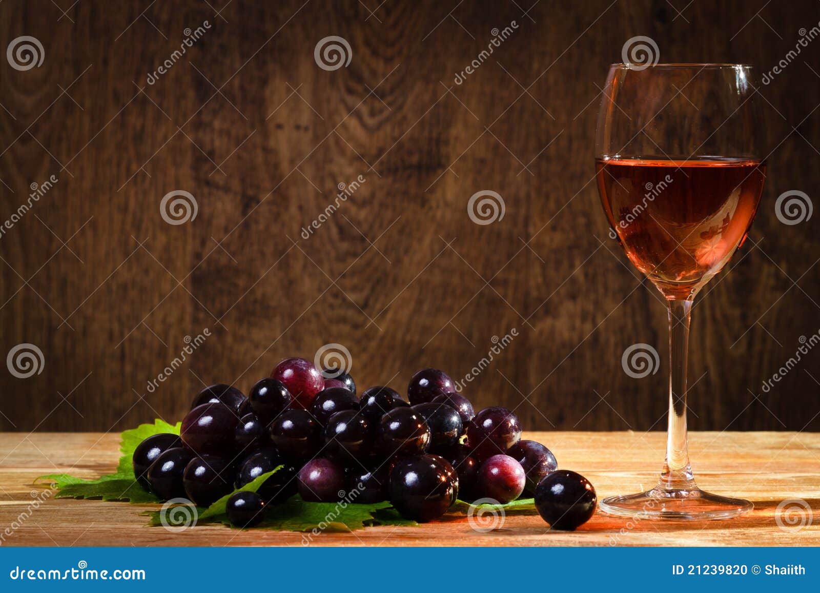 Glass of Rose Wine with Dark Grapes Stock Photo Image of branch