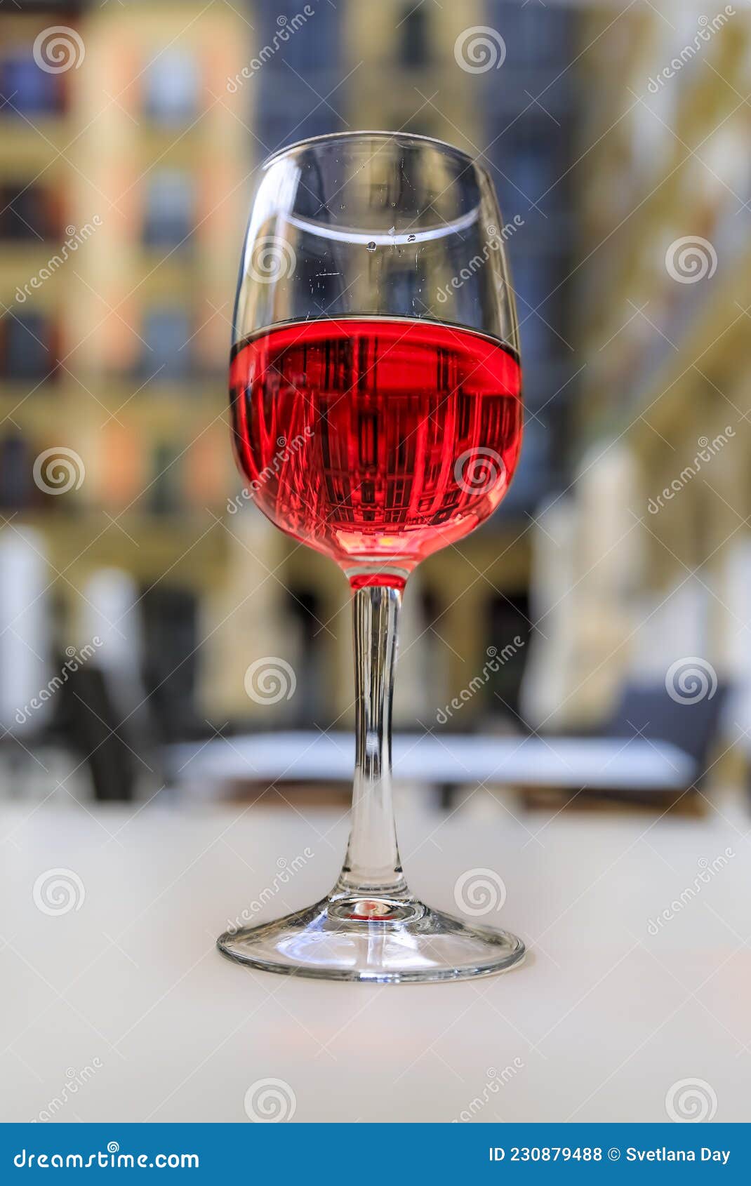 glass of spanish rose or rosado in a restaurant on a square in pamplona, spain