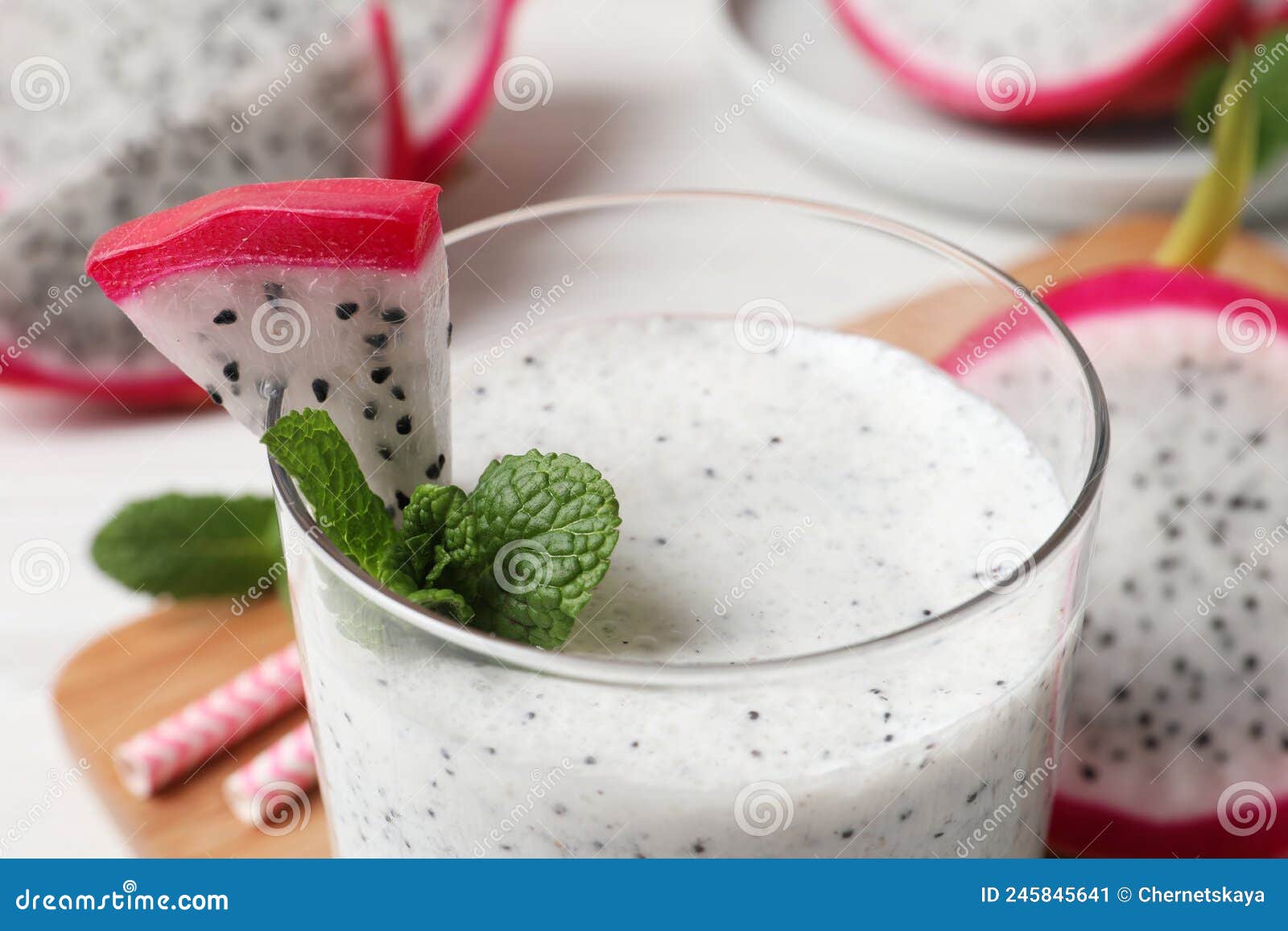 Glass of Tasty Pitahaya Smoothie with Fresh Mint on Table, Closeup ...