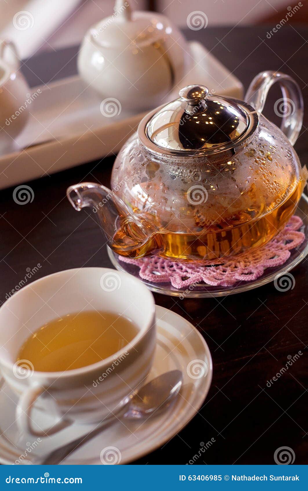 Glass teapot and cup stock image. Image of healthy, drink 63406985