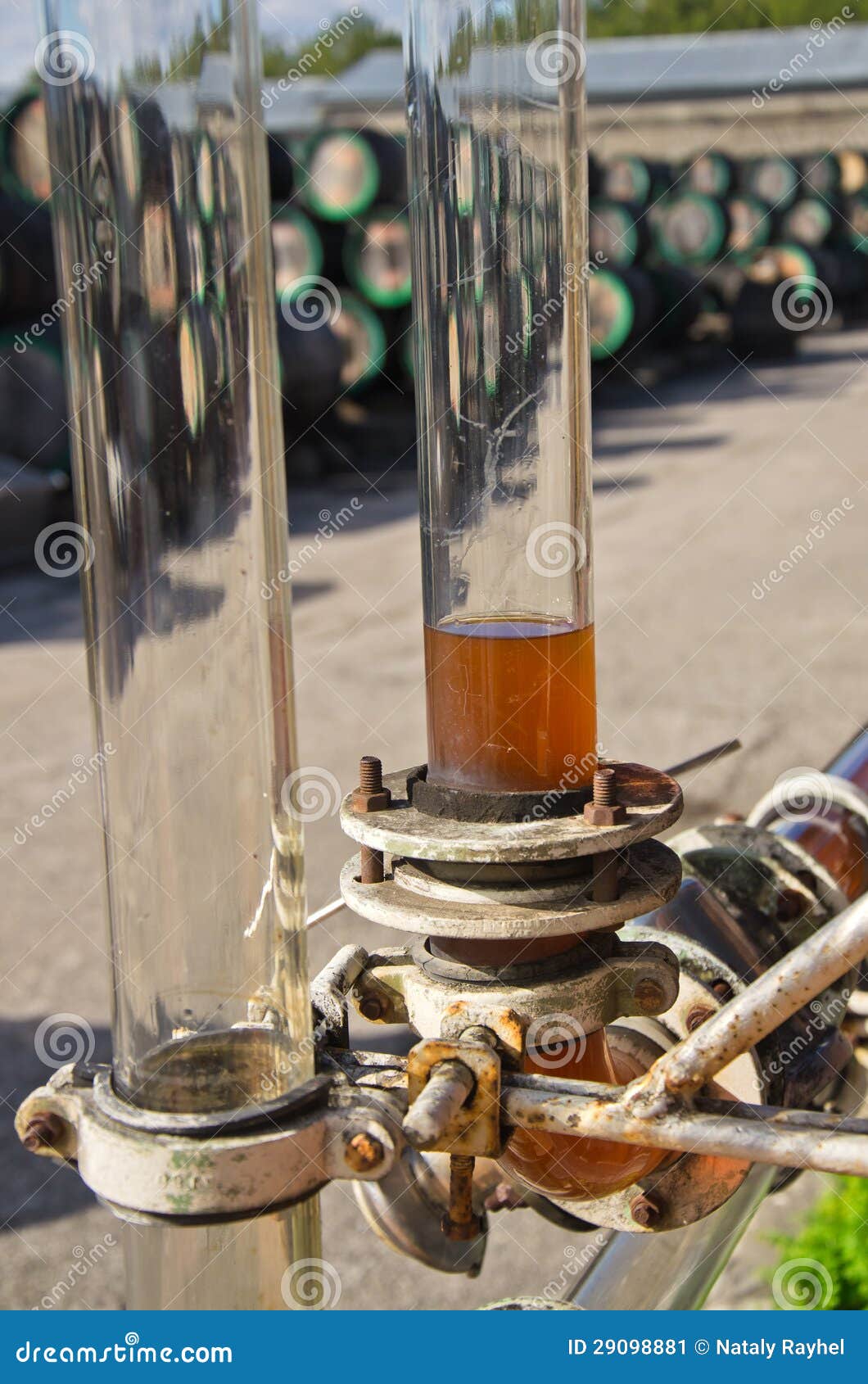 Glass tube with wine stock image. Image of machinery 29098881