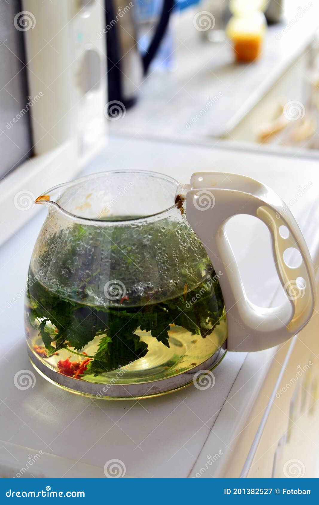 Glass Watering Can with Tea Stock Image Image of rosehip, health