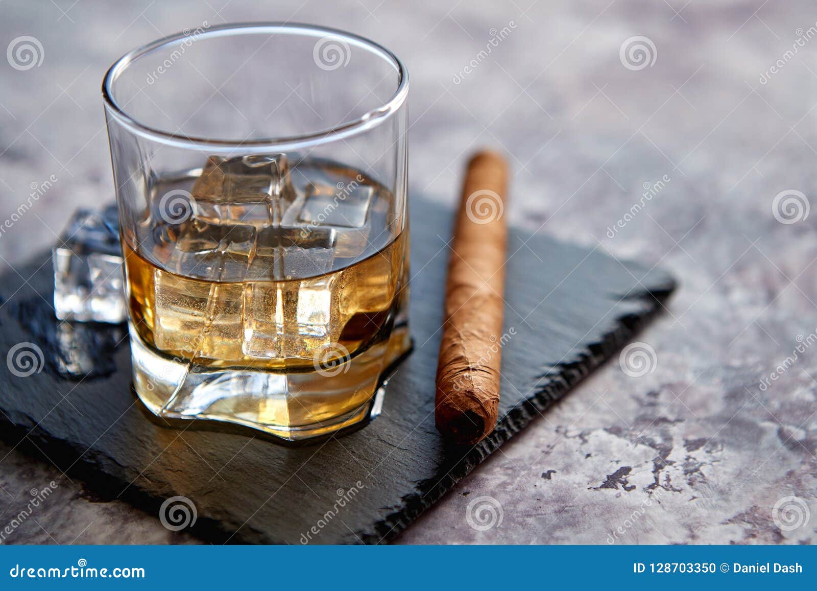 Whiskey with ice cubes Stock Photo by Givaga