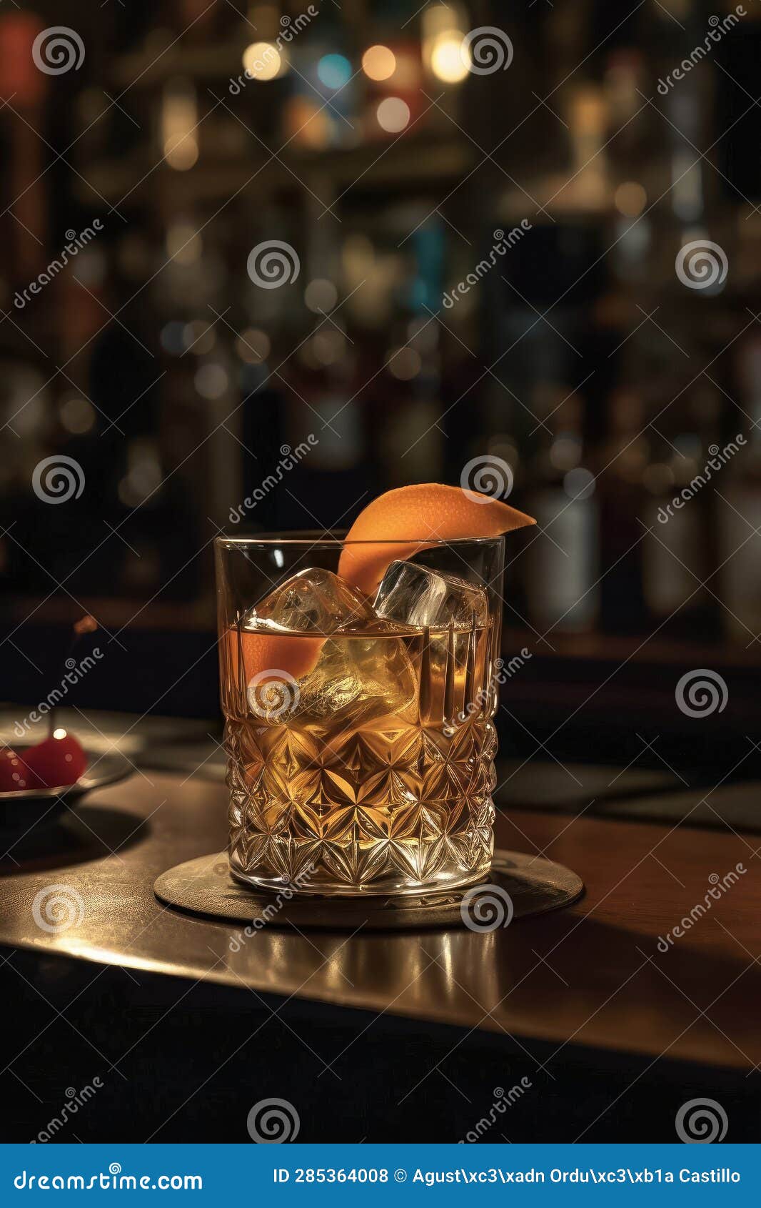 Glass of Whiskey with Ice, Served on the Counter of a Bar. Stock Photo