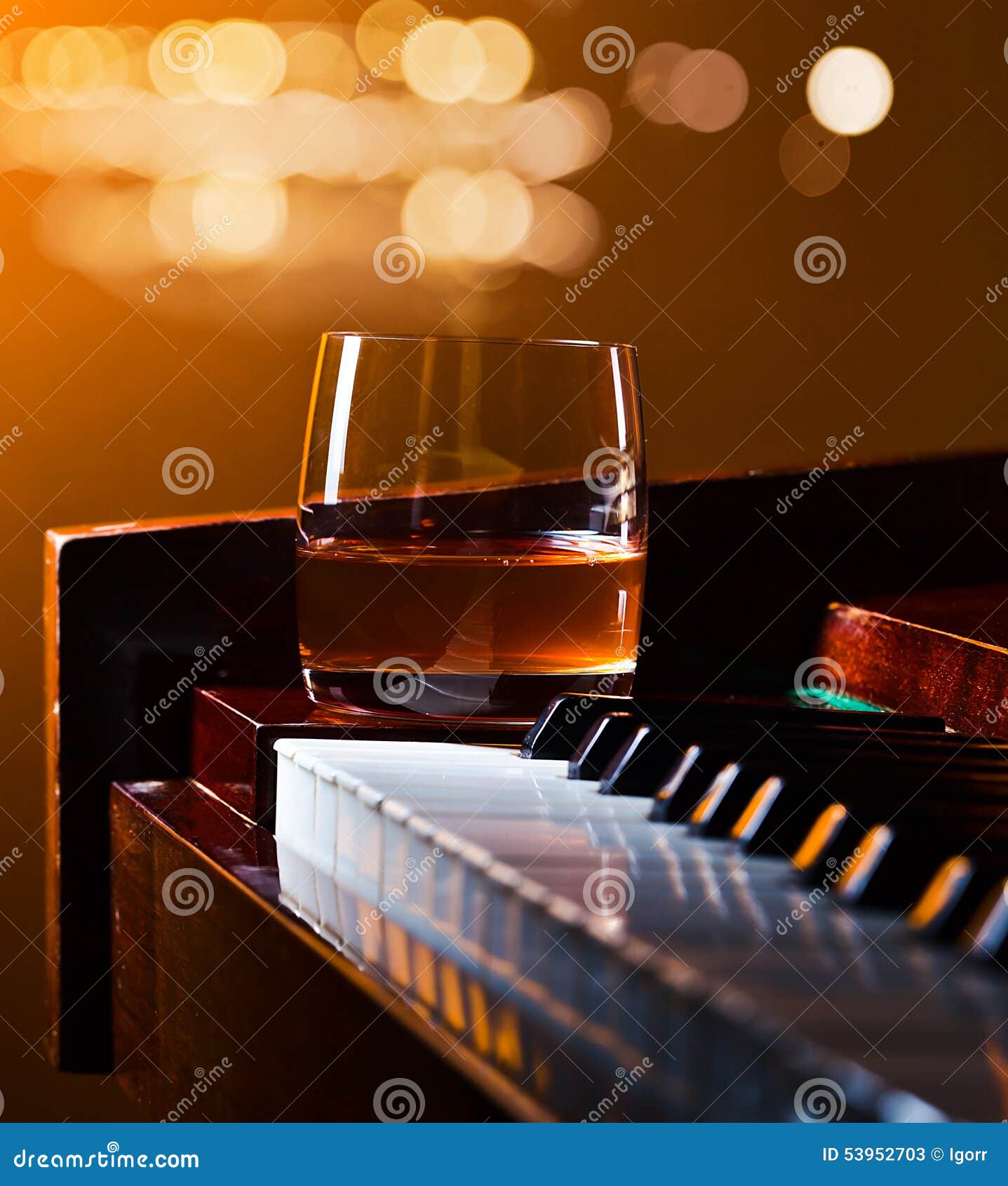 Glass with whiskey stock image. Image of orange, instrument 53952703