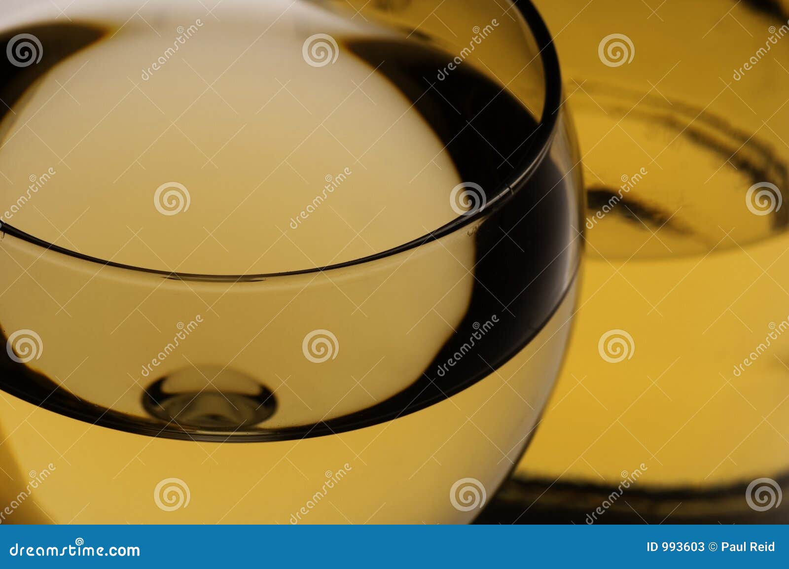 glass of white wine and bottle