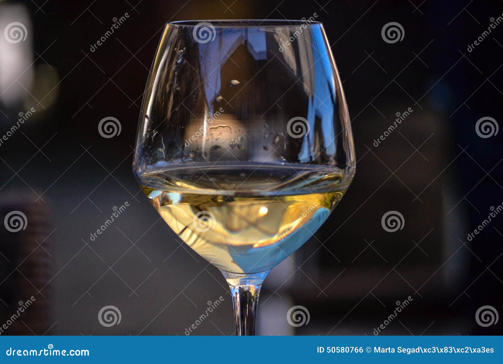 Glass of White Wine Half Full Stock Photo Image of water, white 50580766