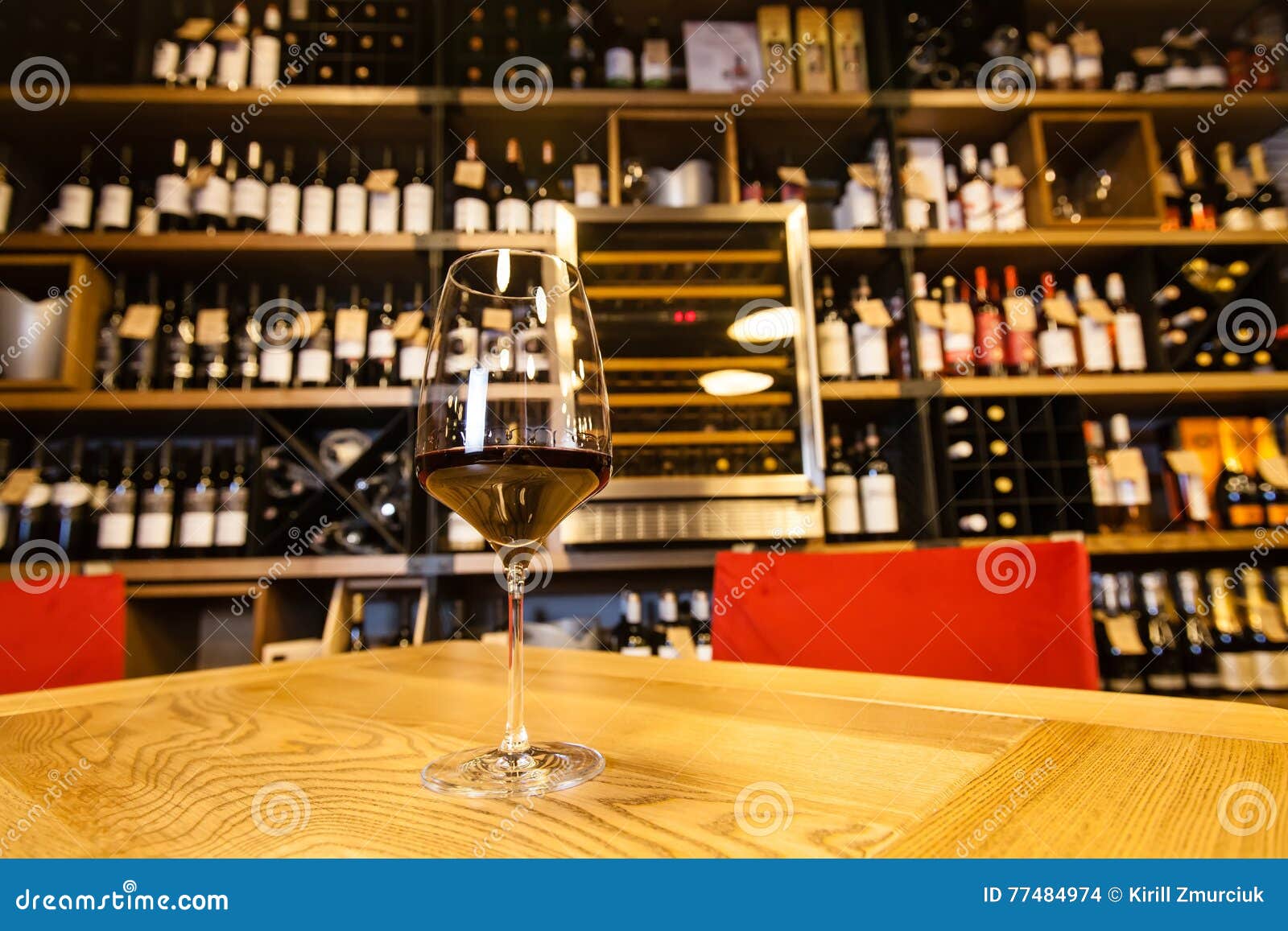 Glass of wine in a bar stock photo. Image of glass, counter 77484974