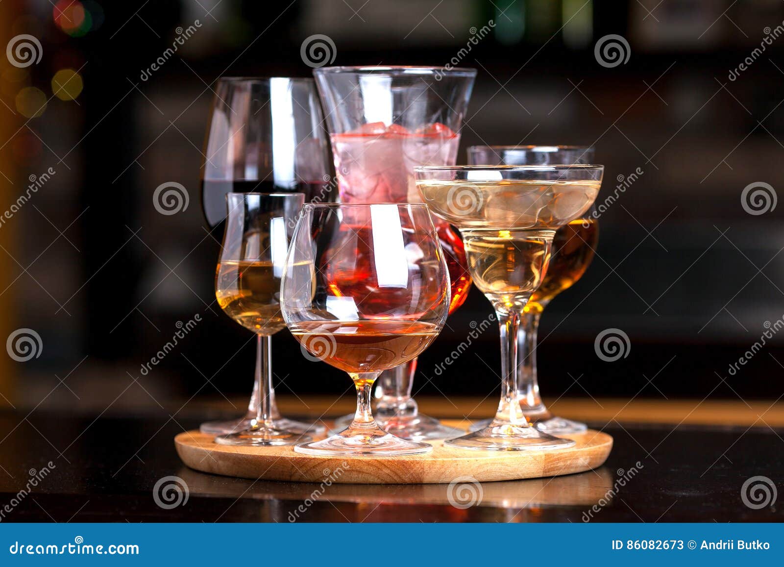 Glasses with alcohol stock image. Image of drinks, alcohol 86082673
