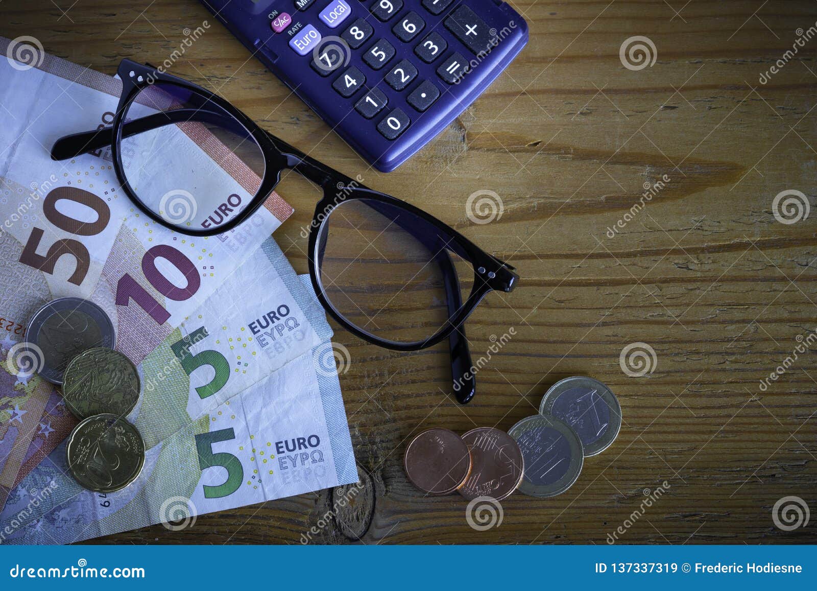 glasses and banknotes in euros