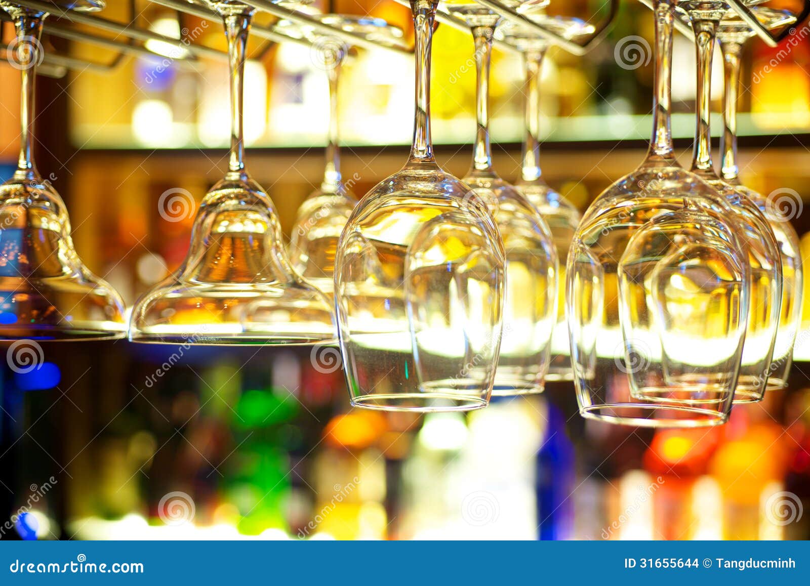 Glasses at a bar stock photo. Image of rack, cocktails 31655644