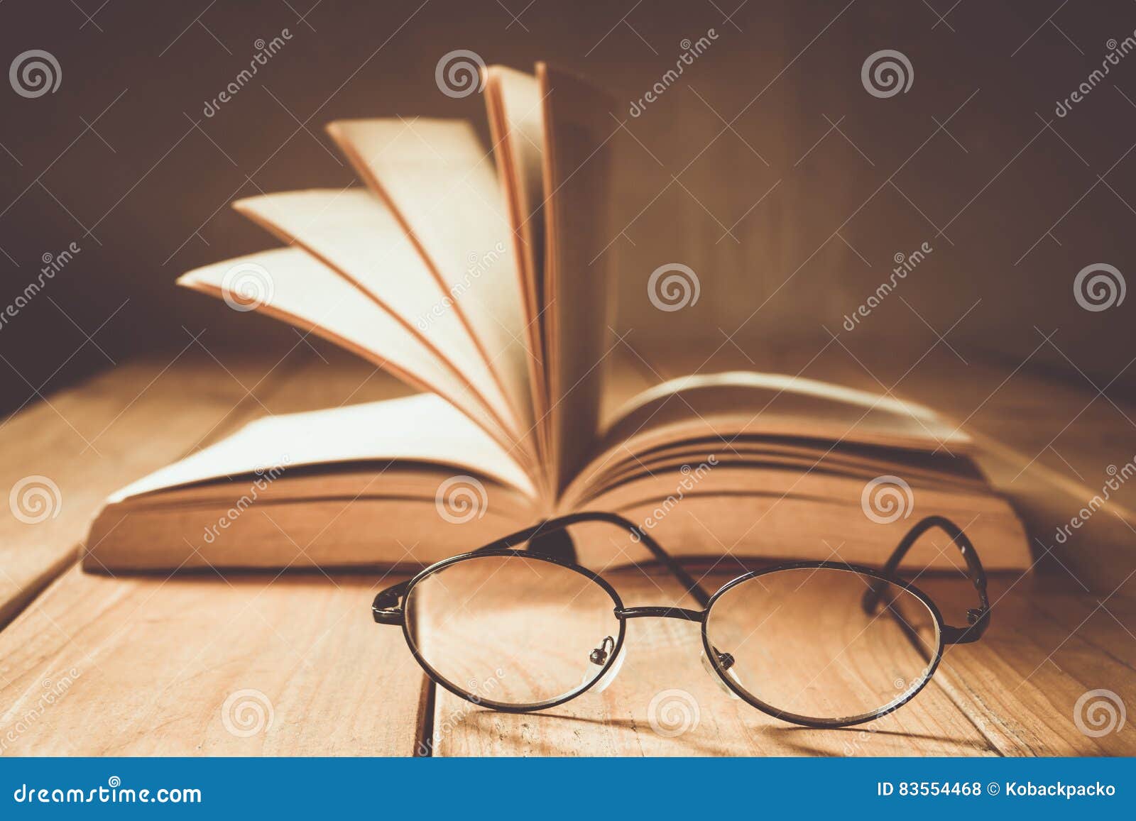 Glasses and book stock photo. Image of document, bookshelf 83554468