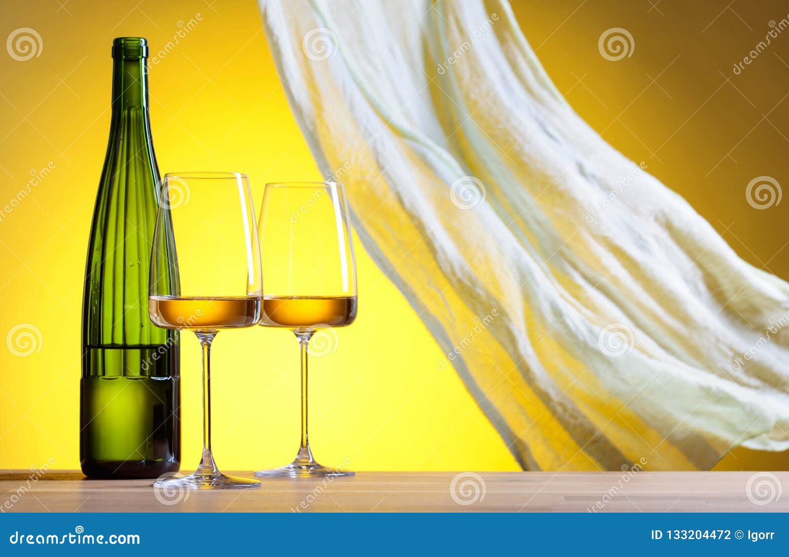 Download Glasses And Bottle Of White Wine On A Yellow Background Stock Photo Image Of Chardonnay Light 133204472 Yellowimages Mockups