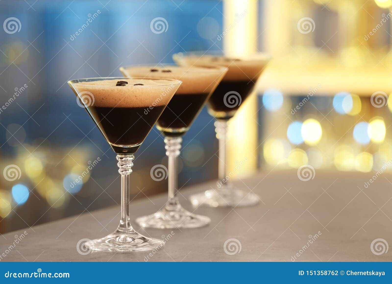 glasses of delicious espresso martini on bar counter