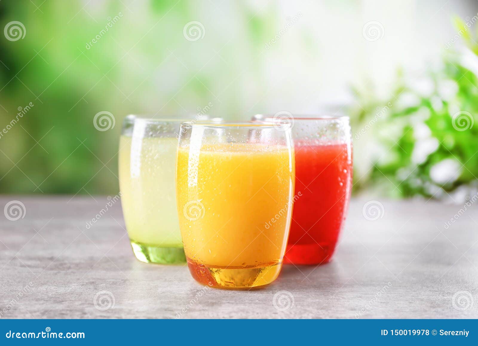 Glasses with Different Citrus Juices on Table Stock Photo Image of