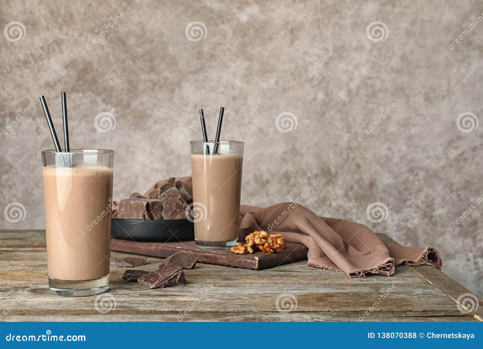 Glasses with Healthy Protein Shake and Ingredients on Table. Stock