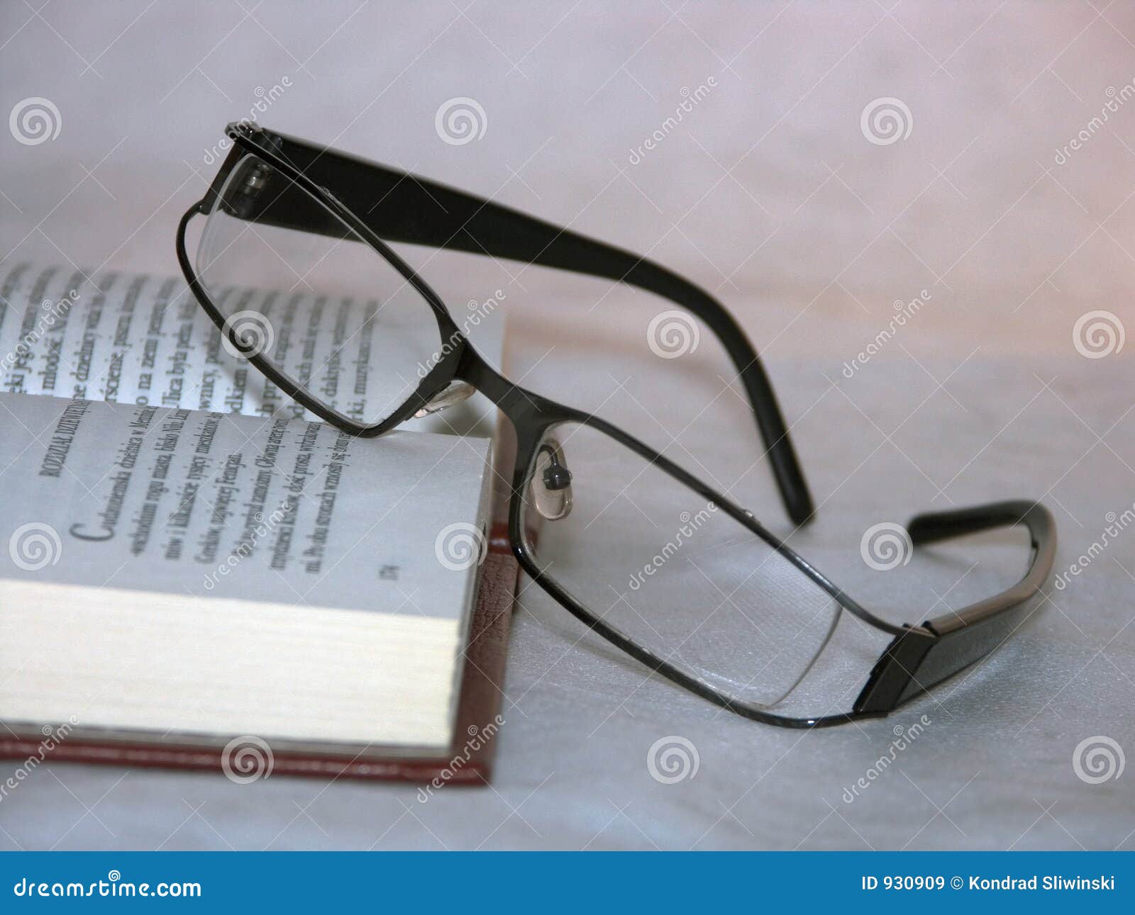 Glasses laying on a book stock image. Image of reading 930909