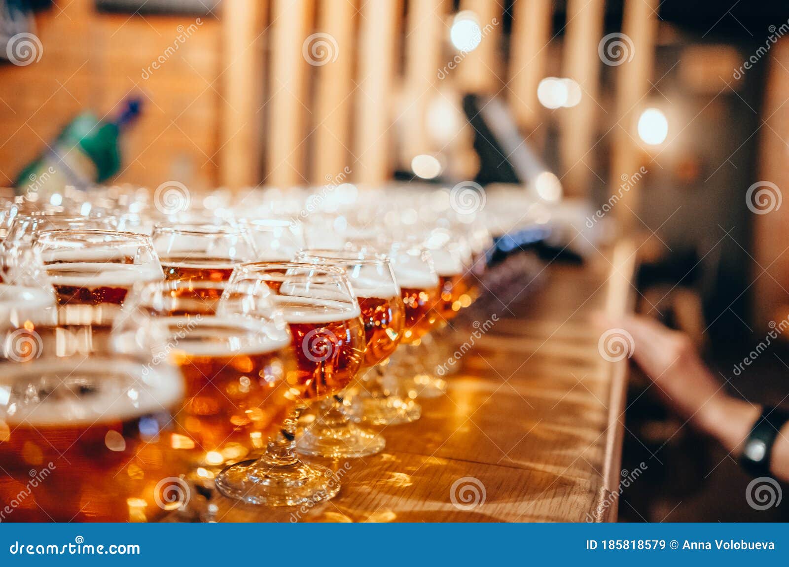 Glasses Of Light Beer On Wooden Bar Counter. Bar On Background Stock ...