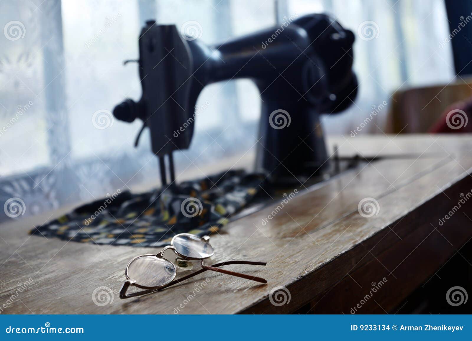 Glasses and sewing machine stock photo. Image of garment 9233134