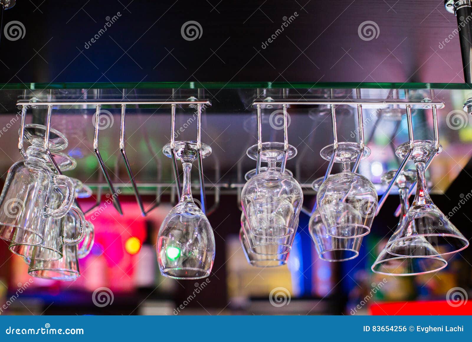 Glasses in Shelf Above a Bar Rack Stock Photo Image of cocktail