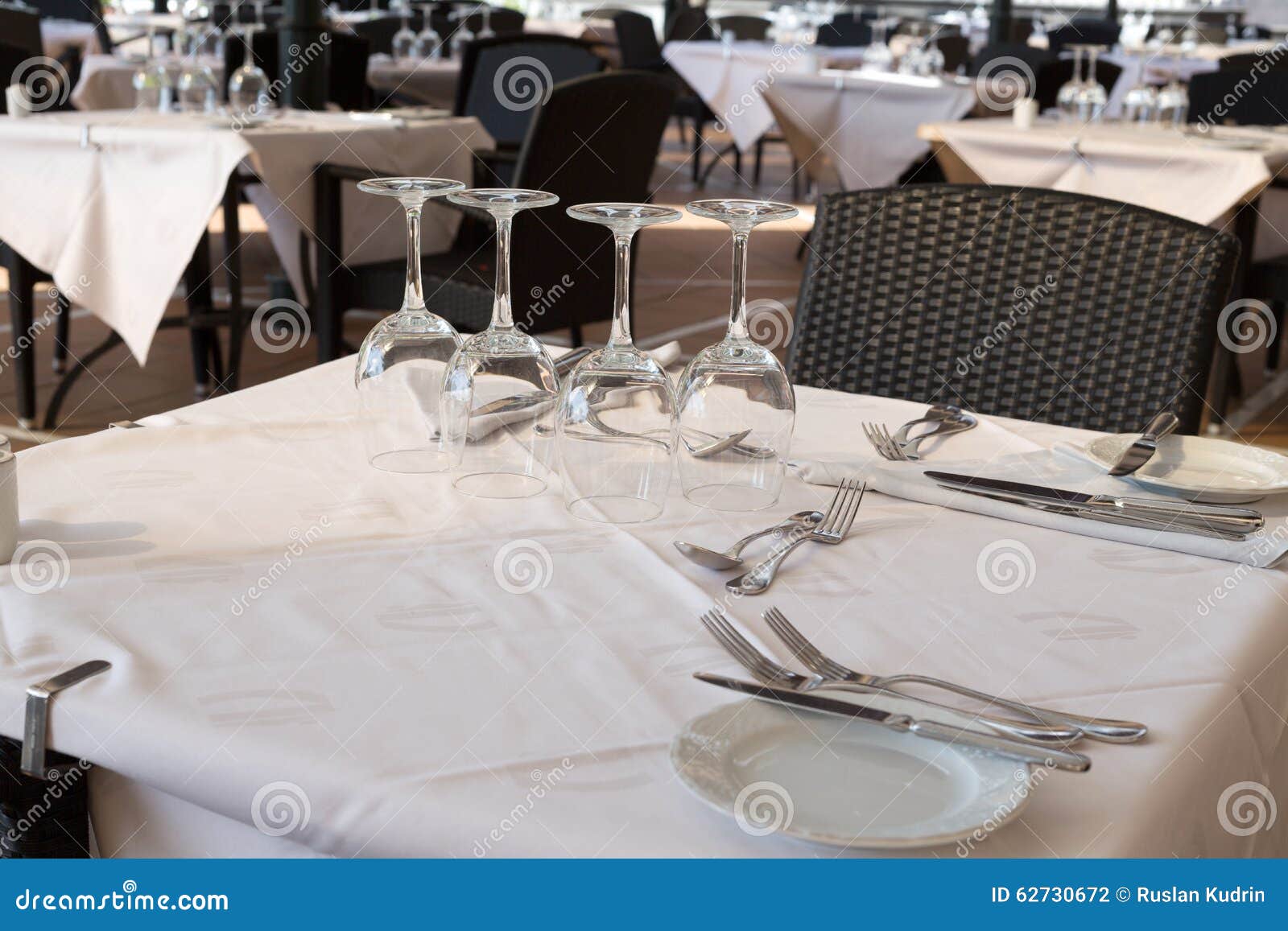Glasses on a Table in a Restaurant Stock Photo Image of cloth, fork