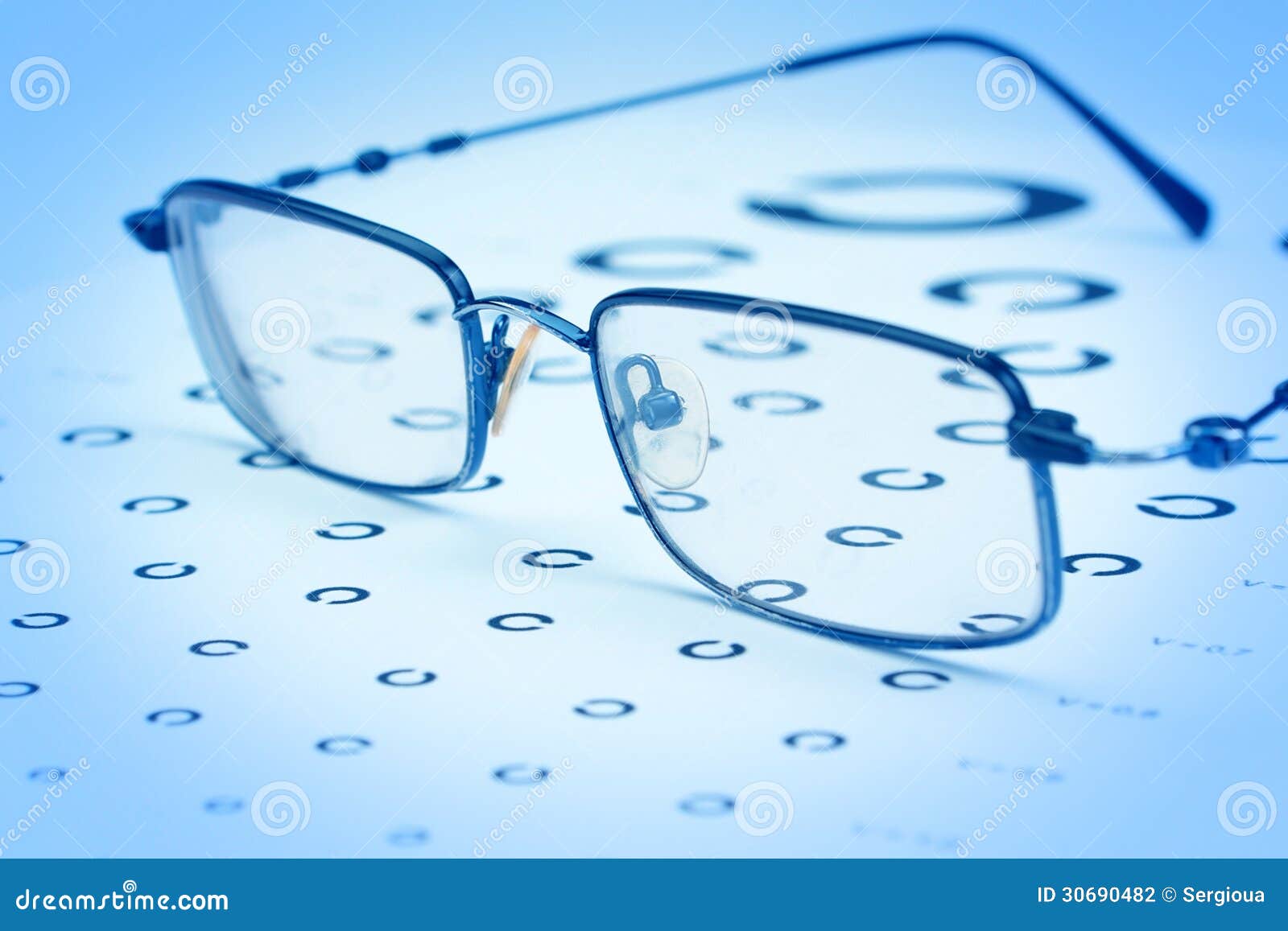 Glasses To Improve Vision on the Test Card. Stock Photo Image of