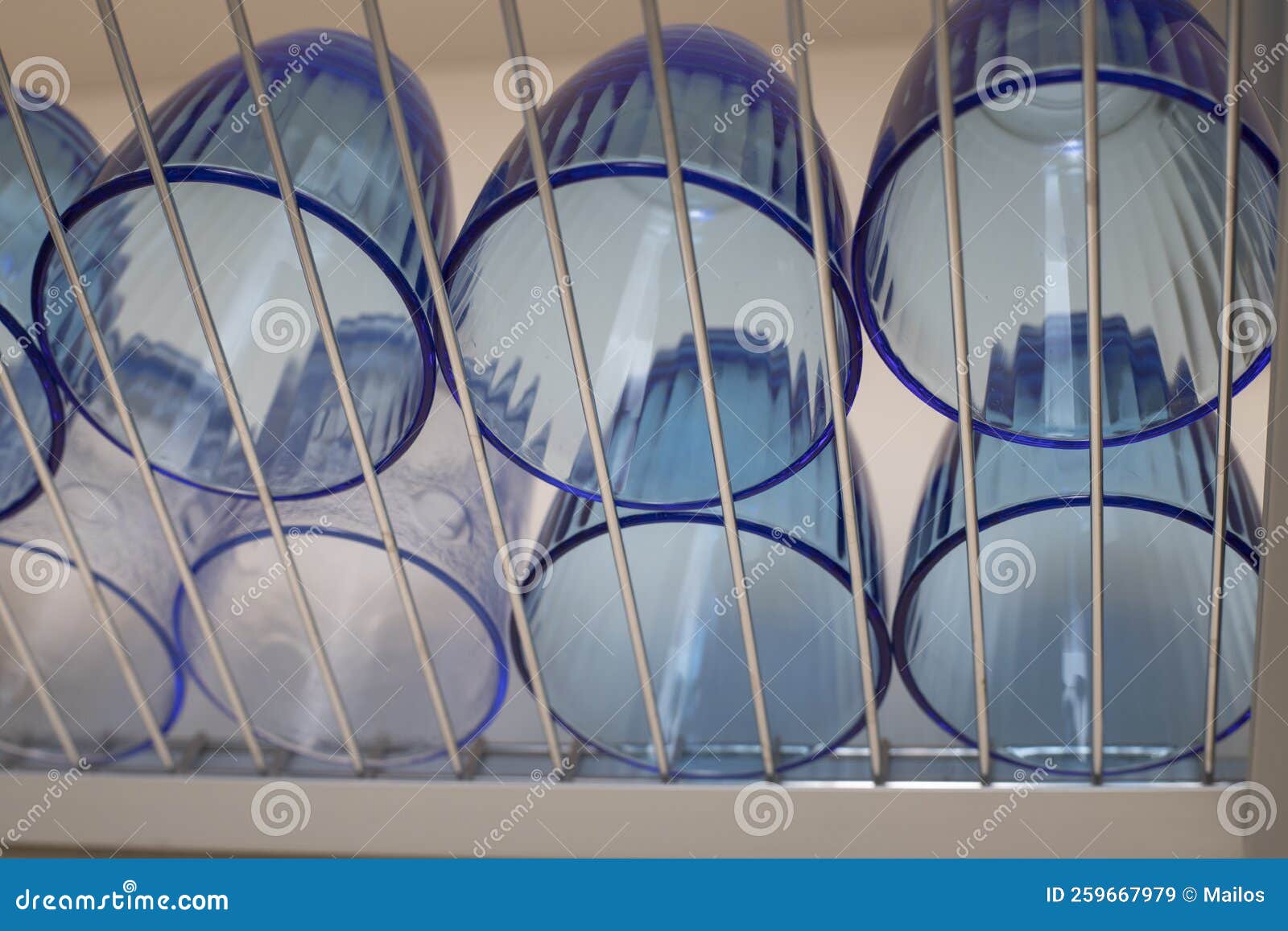 Glasses Turned Upside Down in a Dish Drainer. Stock Image Image of