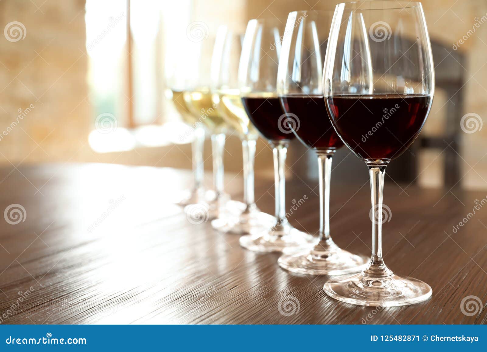 Glasses of White and Red Wines on Table Stock Image Image of drink