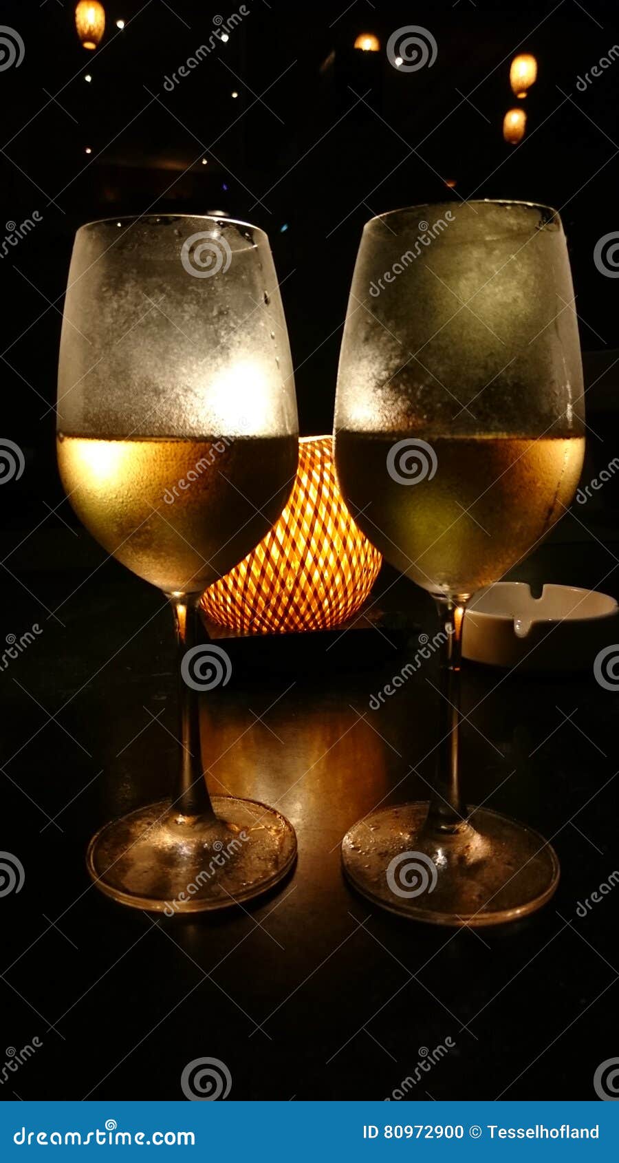Glasses of White Wine by Candle Light Stock Photo Image of drinks, glass 80972900