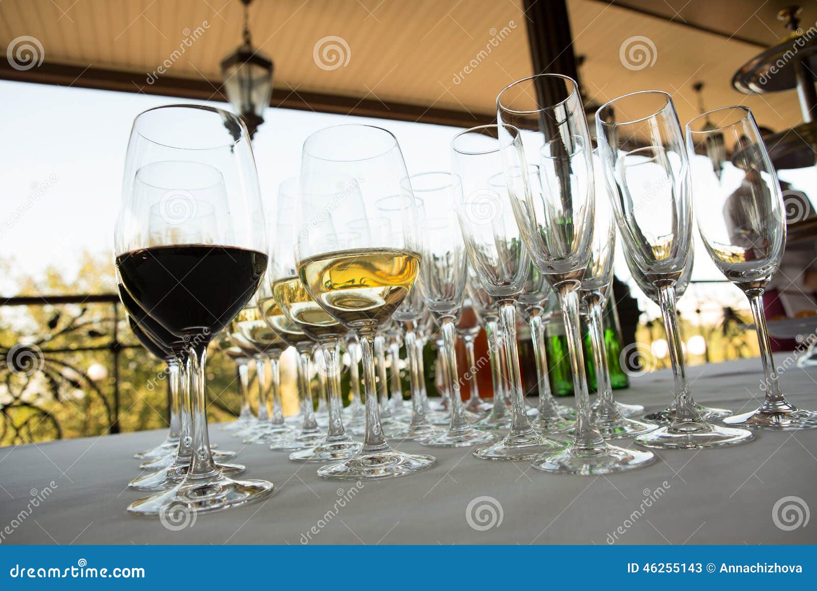 Glasses of wine at the bar stock image. Image of bottle 46255143