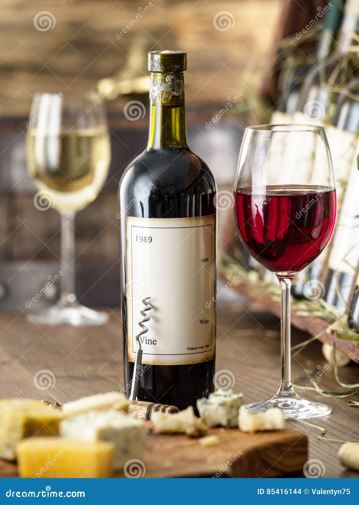 Glasses of Wine and Cheese Plate. Stock Photo Image of shelf