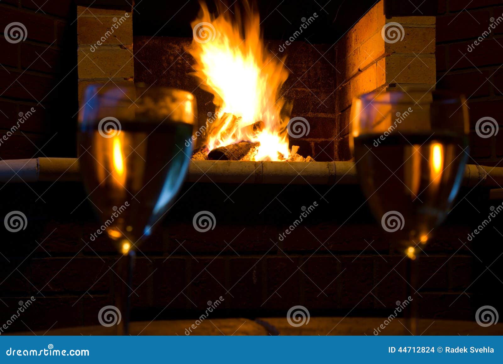 Glasses of Wine in Front of a Fireplace Stock Photo Image of burn