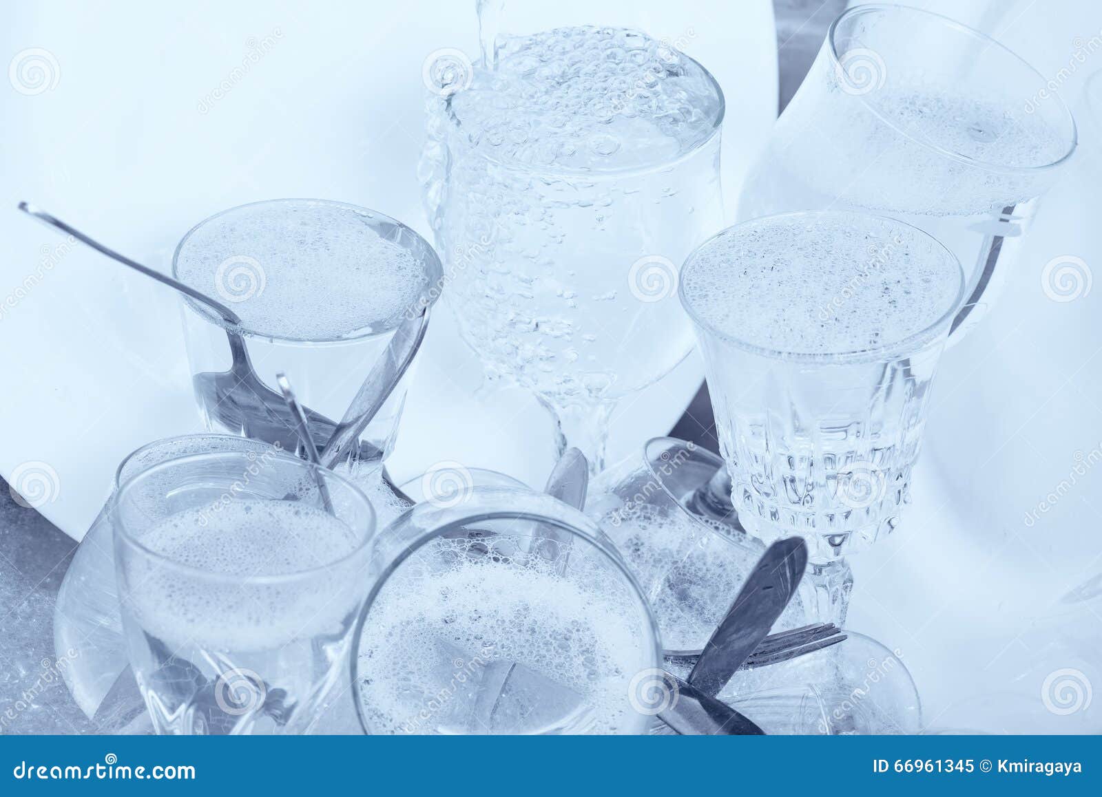 Glassware,cutlery and Dishes in the Kitchen Sink Stock Image Image of