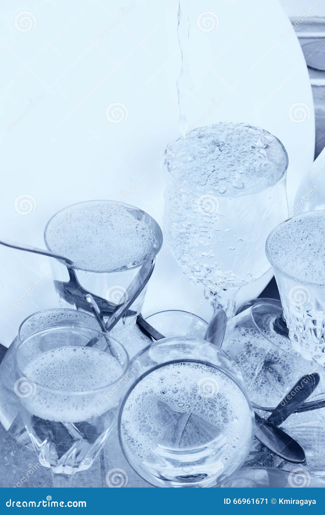 Glassware,cutlery and Dishes in the Kitchen Sink Stock Image Image of