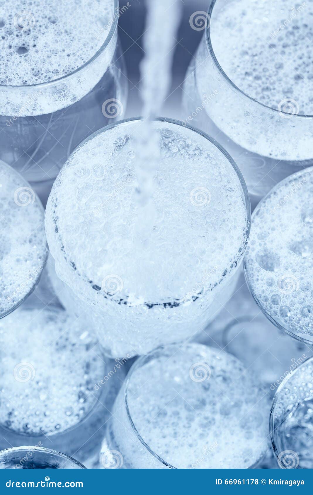 Glassware Under a Water Jet in the Kitchen Sink Stock Photo Image of