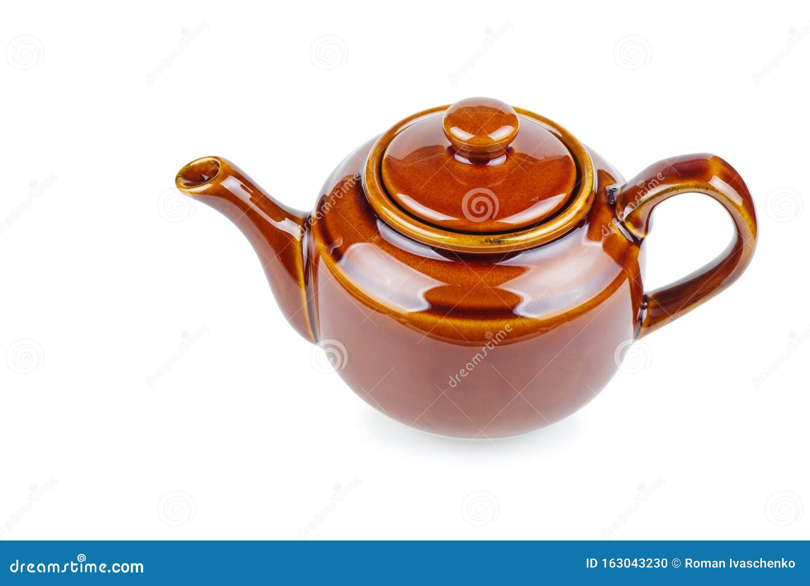 Glazed Brown Ceramic Teapot Isolated on White Background Stock Photo