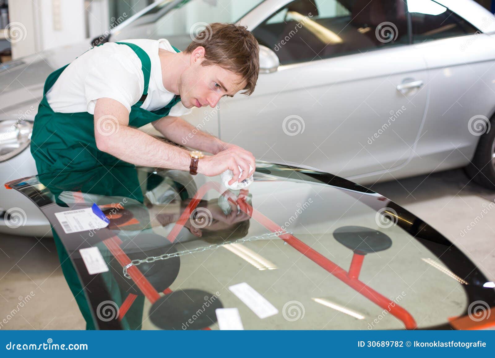 Glazier with Car Windshield Made of Glass Stock Photo Image of
